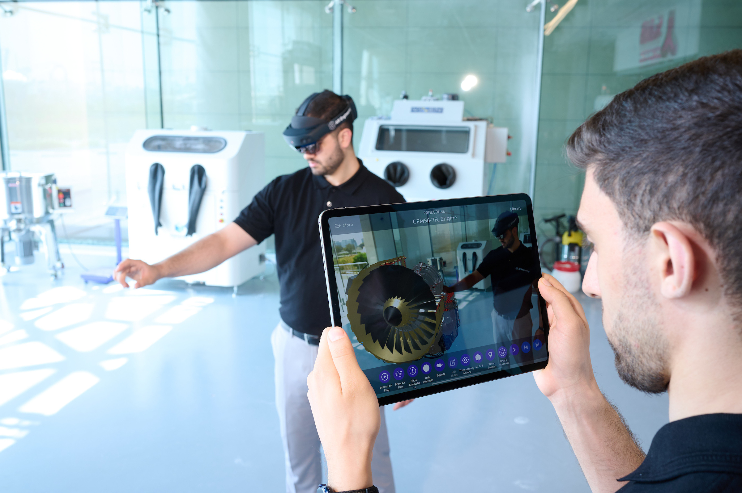 AR Engineering team using headsets and iPads to demonstrate AR training